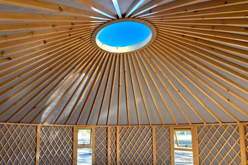 Looking up at the ORON's clear dome skylight at the centre of the rafters