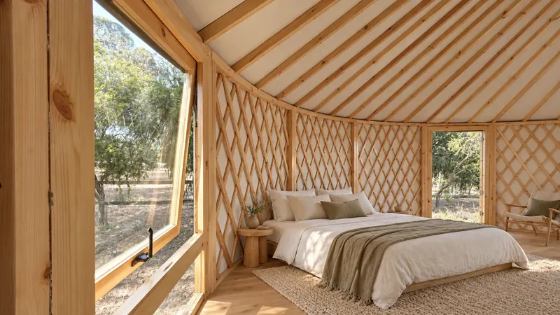 Styled ORON bedroom with lattice walls and an open window